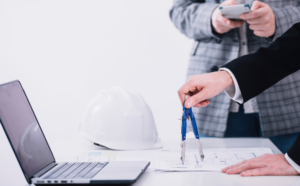 engineer taking measurements for obtaining an opening license